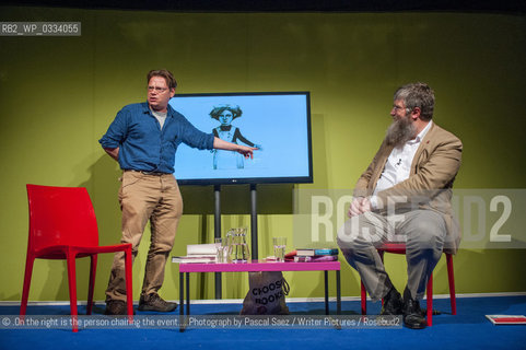 Edward Carey (left) , British writer and illustrator, on stage at the Edinburgh International Book Festival. 10th August 2014..©.On the right is the person chairing the event.....Photograph by Pascal Saez/Writer Pictures/Rosebud2