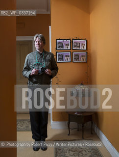 Michel Faber, author in his Edinburgh flat. 29th September 2014..©.Photograph by Robert Perry/Writer Pictures/Rosebud2