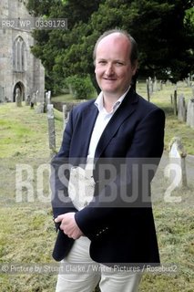 Ian Mortimer, the Moretonhampsted based author of The Time Travellers Guide to Elizabethan England. The bestselling author signed books at the first Chagword Literary Festival event at Chagford Devon. Chagword Literary Festival opens in March 2013. Pictured here in the churchyard of St Michaels church Chagford. ..©Picture by Stuart Clarke/Writer Pictures/Rosebud2