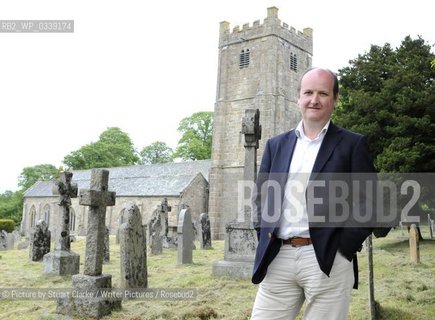 Ian Mortimer, the Moretonhampsted based author of The Time Travellers Guide to Elizabethan England. The bestselling author signed books at the first Chagword Literary Festival event at Chagford Devon. Chagword Literary Festival opens in March 2013. Pictured here in the churchyard of St Michaels church Chagford. ..©Picture by Stuart Clarke/Writer Pictures/Rosebud2