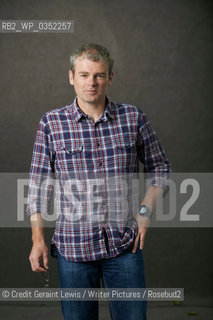 Mark Haddon novelist and writer of The Red House. Pictured at the Edinburgh International Book Festival. Taken 23rd August 2012..©Credit Geraint Lewis/Writer Pictures/Rosebud2