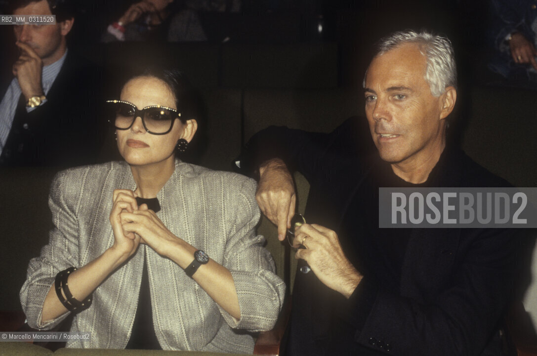 Milan, about 1985. Italian fashion designer Giorgio Armani and actress Claudia Cardinale / Milano, 1985 circa. Lo stilista Giorgio Armani e lattrice Claudia Cardinale - ©Marcello Mencarini/Rosebud2