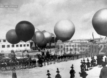Milan International Exhibition in 1906, May 2. Hot-air balloons race at the Aerostatic Park in piazza dArmi designed by engineers Carlo Bianchi, Francesco Magnani and Mario Rondoni / Esposizione Internazionale di Milano del 1906, 2 maggio. Gara di mongolfiere nel Parco Aereostatico a Piazza dArmi, costruito dagli ingegneri Carlo Bianchi, Francesco Magnani e Mario Rondoni - Reproduced by Marcello Mencarini
/Rosebud2