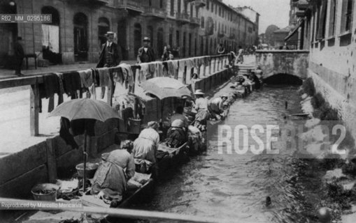 Milan, circa 1900. The Ticinello canal at Porta Ticinese, with scaffolding for laundries / Milano, 1900 circa. Il Cavo Ticinello a porta ticinese con ponteggi di lavanderie - Reproduced by Marcello Mencarini
/Rosebud2