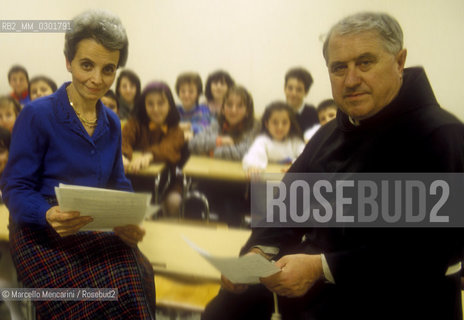 Bologna 1983. Frati Minori dellAntoniano (Franciscan Friars of Sainkt Anthony).  Chorus mistress of the Little Choir of Antoniano Mariele Ventre and Father Bernardo Rossi in the childrens choir school / Bologna 1983. Frati Minori dellAntoniano. Mariele Ventre, direttrice del Piccolo Coro dellAntoniano, e Padre Bernardo Rossi nella scuola del coro - ©Marcello Mencarini/Rosebud2