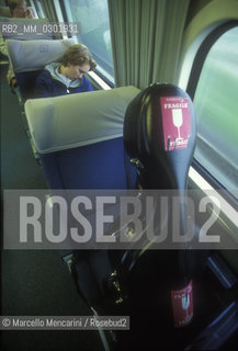 Rome, 1996. Berliner Philharmoniker Orchestra traveling by train  / Roma, 1996. I Berliner Philharmoniker in viaggio in treno - ©Marcello Mencarini/Rosebud2