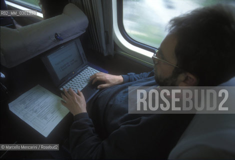 Rome, 1996. Berliner Philharmoniker Orchestra traveling by train  / Roma, 1996. I Berliner Philharmoniker in viaggio in treno - ©Marcello Mencarini/Rosebud2