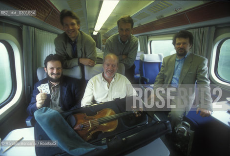 Rome, 1996. Berliner Philharmoniker Orchestra traveling by train  / Roma, 1996. I Berliner Philharmoniker in viaggio in treno - ©Marcello Mencarini/Rosebud2