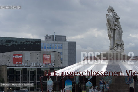 Kassel, Documenta 2007. ”The Exclusive On the Politics of the Excluded Fourth” by Andreas Siekmann with the Documenta Halle in the background. A carousel around the statue of Federick II about the existence of a fourth power, the exclusive (that is the power to violate rights), supplementing the three familiar powers, the legislative, the judiciary and the executive - ©Marcello Mencarini/Rosebud2