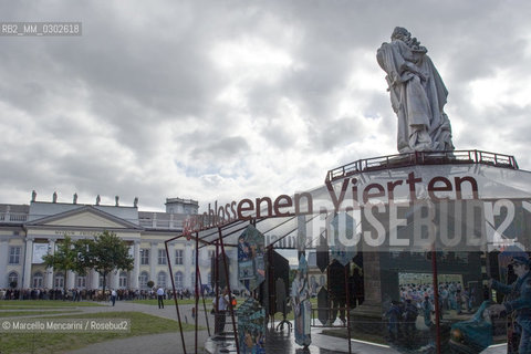 Kassel, Documenta 2007. ”The Exclusive On the Politics of the Excluded Fourth” by Andreas Siekmann. A carousel around the statue of Federick II in front of the Museum Fridericianum about the existence of a fourth power, the exclusive (that is the power to violate rights), supplementing the three familiar powers, the legislative, the judiciary and the executive - ©Marcello Mencarini/Rosebud2