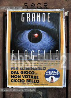 Roma, aprile 2008. Manifesto di propaganda elettorale del partito Alleanza Nazionale (AN) a sostegno di Gianni Alemanno candidato sindaco della città di Roma, contro il suo maggiore avversario, il sindaco uscente Francesco Rutelli che viene definito grande flagello usando il logo della trasmissione televisiva Grande Fratello e lo slogan: per eliminarlo da gioco … non votare Ciccio Bello (soprannome di Rutelli) - ©Marcello Mencarini/Rosebud2
