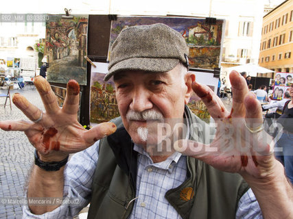 Rome, October 2012. A painter of Piazza Navona / Roma, ottobre 2012. Un pittore di piazza Navona - ©Marcello Mencarini/Rosebud2
