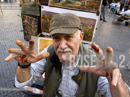 Rome, October 2012. A painter of Piazza Navona / Roma, ottobre 2012. Un pittore di piazza Navona - ©Marcello Mencarini/Rosebud2