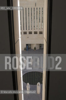 MART, Museum of Modern and Contemporary Art of Trento and Rovereto designed by Mario Botta. Sculptures by Mimmo Paladino  in the central square seen from a window of the perimeter / MART, Museo di arte moderna e contemporanea di Trento e Rovereto progettato da Mario Botta. Sculture di Mimmo Paladino nela piazza centrale, viste da una finestra del perimetro - ©Marcello Mencarini/Rosebud2