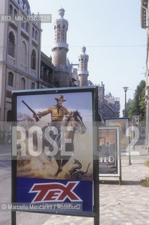 Venice Lido, Venice Film Festival 1985. Poster of the movie Tex il signore degli abissi (Tex The Lord of The Deep) by Duccio Tessari in front of the Excelsior Hotel / Lido di Venezia, Mostra del Cinema di Venezia 1985. Poster del film Tex il signore degli abissi di Duccio Tessari davanti allHotel Excelsior - ©Marcello Mencarini/Rosebud2