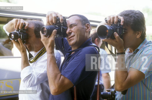 Venice Lido, Venice Film Festival, about 1985. Photographers at a photo-call / Lido di Venezia, Mostra del Cinema di Venezia, 1985 circa. Fotografi a un photo-call  - ©Marcello Mencarini/Rosebud2