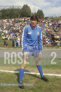 Italian National Singers Football Team, 1987. Singer Gianni Morandi on the game field / Nazionale italiana cantanti, 1987. Il cantante Gianni Morandi in campo - ©Marcello Mencarini/Rosebud2
