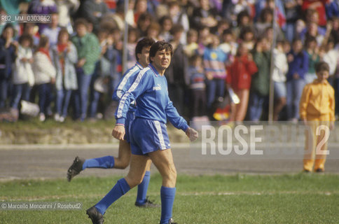 Italian National Singers Football Team, 1987. Italian pop singer Gianni Morandi on the game field / Nazionale italiana cantanti, 1987. Il cantante Gianni Morandi in campo - ©Marcello Mencarini/Rosebud2