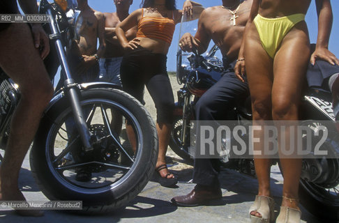 Ostia Lido (Rome), Castelporziano free beach (also known as i cancelli, in english: the gates), 1999. Pino la Bestia (in english: Pino the beast) and his friends / Lido di Ostia (Roma), spiaggia libera di Castelporziano (detta i cancelli), 1999. Pino la bestia e i suoi amici - ©Marcello Mencarini/Rosebud2