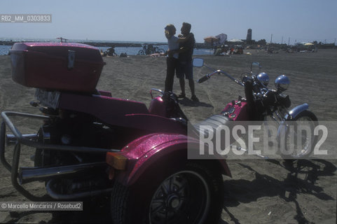 Ostia Lido (Rome), 1999. Bike on the seaside / Lido di Ostia (Roma), 1999. Moto sulla spiaggia - ©Marcello Mencarini/Rosebud2