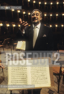 Rome Opera House, January 2000. Spanish tenor and conductor Placido Domingo poses during a rehearsal of Tosca conducted by himself and performed on occasion of its centenary in the same theater of its debut (directed by Franco Zeffirelli, conducted by Placido Domingo, starring Ines Salazar and Luciano Pavarotti) / Teatro dellOpera di Roma, gennaio 2000. Il tenore e direttore dorchestra Placido Domingo posa durante le prove di Tosca, diretta da lui stesso in occasione dei cento anni dal debutto di questopera (regia: Franco Zeffirelli, direttore dorchestra: Placido Domingo, protagonisti: Ines Salazar e Luciano Pavarotti) - ©Marcello Mencarini/Rosebud2