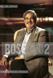 Rome Opera House, January 12, 2000. Spanish tenor and conductor Placido Domingo poses during a rehearsal of Tosca conducted by himself and performed on occasion of its centenary in the same theater of its debut (directed by Franco Zeffirelli, conducted by Placido Domingo, starring Ines Salazar and Luciano Pavarotti) / Teatro dellOpera di Roma, 12 gennaio 2000. Il tenore e direttore dorchestra Placido Domingo posa durante le prove di Tosca, diretta da lui stesso in occasione dei cento anni dal debutto di questopera (regia: Franco Zeffirelli, direttore dorchestra: Placido Domingo, protagonisti: Ines Salazar e Luciano Pavarotti) - ©Marcello Mencarini/Rosebud2