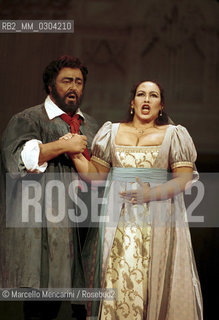Rome Opera House, January 12, 2000. Tenor Luciano Pavarotti and soprano ines Salazar in Tosca by Giacomo Puccini, performed on occasion of its centenary in the same theater of its debut (directed by Franco Zeffirelli, conducted by Placido Domingo, starring Ines Salazar and Luciano Pavarotti) / Roma, Teatro dellOpera, 12 gennaio 2000. Il tenore Luciano Pavarotti e il soprano Ines Salazar in Tosca di Giacomo Puccini, rappresentata cento anni dopo nello stesso teatro del suo debutto (regia: Franco Zeffirelli, direttore dorchestra: Placido Domingo, protagonisti: Ines Salazar e Luciano Pavarotti) - ©Marcello Mencarini/Rosebud2