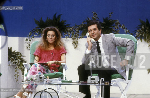 Renzo Villa, founder of the Italian private television station Antenna 3, and Patrizia Cecchi during a tv program (about 1980) / Renzo Villa, fondatore della televisione privata italiana Antenna 3, e Patrizia Cecchi durante un programma (1980 circa) - ©Marcello Mencarini/Rosebud2