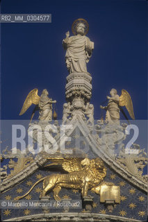 Venice, 1998. St. Marks statue on the top of the St. Marks Basilica facade / Venezia,  1998. Statua di San Marco nella parte superiore della facciata della basilica di San Marco - ©Marcello Mencarini/Rosebud2