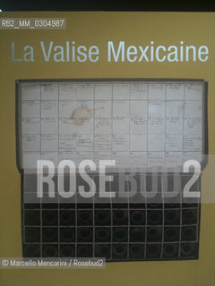 Arles (France), 2011. Photographer Robert Capas famous Mexican Suitcase, exhibited for the first time after more than 70 years in the photography festival Les Rencontres dArles 2011. In the suitcase there were three small boxes containing nearly 4,500 negatives about the Spanish Civil War between 1936 and 1939 made ​​by Robert Capa, his partner Gerda Taro and Chim (David Seymour). Lost in France in 1940, the suitcase was found in Mexico in the early 90s and returned in 2007 at the International Center of Photography (ICP) in New York, guardian of the work of Capa  / Arles (Francia), 2011. La famosa Valigia Messicana del fotografo Robert Capa, esposta per la prima volta dopo più di 70 anni al festival di fotografia Les Rencontres dArles 2011. Il contenuto della valigia è composto di tre piccole scatole contenenti quasi 4.500 negativi sulla guerra civile spagnola tra il 1936 e il 1939 realizzati da Robert Capa, dalla sua compagna Gerda Taro e da Chim (David Seymour). Dopo essere sparita in Francia nel 1940, la valigia è stata ritrovata in Messico agli inizi degli anni 90 e restituita nel 2007 al Centro Internazionale di Fotografia (ICP) di New York, custode dellopera di Capa - ©Marcello Mencarini/Rosebud2