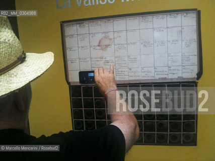 Arles (France), 2011. Photographer Robert Capas famous Mexican Suitcase, exhibited for the first time after more than 70 years in the photography festival Les Rencontres dArles 2011. In the suitcase there were three small boxes containing nearly 4,500 negatives about the Spanish Civil War between 1936 and 1939 made ​​by Robert Capa, his partner Gerda Taro and Chim (David Seymour). Lost in France in 1940, the suitcase was found in Mexico in the early 90s and returned in 2007 at the International Center of Photography (ICP) in New York, guardian of the work of Capa  / Arles (Francia), 2011. La famosa Valigia Messicana del fotografo Robert Capa, esposta per la prima volta dopo più di 70 anni al festival di fotografia Les Rencontres dArles 2011. Il contenuto della valigia è composto di tre piccole scatole contenenti quasi 4.500 negativi sulla guerra civile spagnola tra il 1936 e il 1939 realizzati da Robert Capa, dalla sua compagna Gerda Taro e da Chim (David Seymour). Dopo essere sparita in Francia nel 1940, la valigia è stata ritrovata in Messico agli inizi degli anni 90 e restituita nel 2007 al Centro Internazionale di Fotografia (ICP) di New York, custode dellopera di Capa - ©Marcello Mencarini/Rosebud2