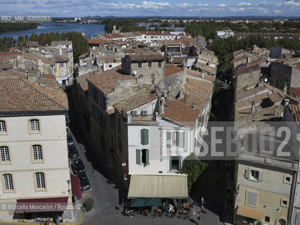 Arles, France, 2013. View from the Arena: rue Voltaire and rue de lamphithéâtre with the Rhone river in the background / Arles, Francia, 2013. Veduta dallArena: rue Voltaire e rue de lamphithéâtre con il fiume Rodano sullo sfondo - ©Marcello Mencarini/Rosebud2