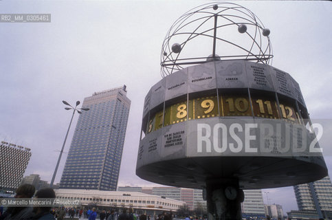 East Berlin, 1989. The universal clock with the solar system installed in 1969 in Alexanderplatz / Berlino Est, 1989. Lorologio universale con il sistema solare installato nel 1969 in Alexanderplatz - ©Marcello Mencarini/Rosebud2