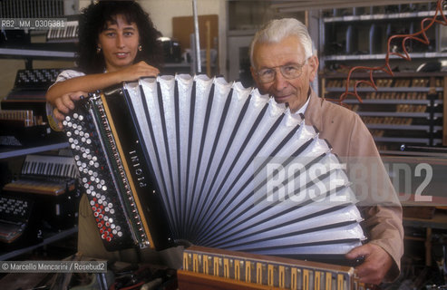 Castelfidardo (Italy), about 1988. Gino Pigini and his daughter Francesca, owners of the Pigini Accordion Factory / Castelfidardo (Ancona). Gino Pigini e sua figlia Francesca, proprietari della Fabbrica di fisarmoniche Pigini - ©Marcello Mencarini/Rosebud2