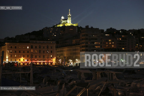 Marseille by night viewed from the Old Port with the Basilica of Notre Dame De La Garde on the background  / Marsiglia di notte vista dal Vacchio Porto con la basilica di Notre Dame de la Garde sullo sfondo - ©Marcello Mencarini/Rosebud2