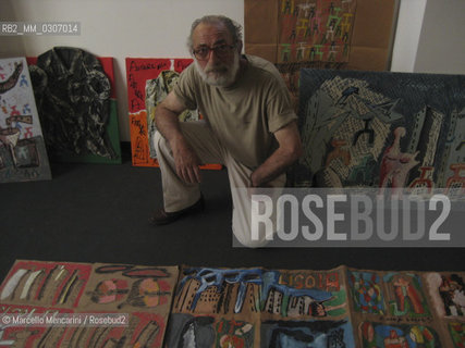 Milan, Isola district, June 2009. Painter Francesco Magli in his studio located in the building Stecca degli Artigiani that will be demolished to build the new constructions of the urban renewal plan Progetto Porta Nuova (Porta Nuova Project) / Milano, quartiere Isola, giugno 2009. Il pittore Francesco Magli nel suo studio che si trova nelledificio della Stecca degli artigiani che sarà abbattuto per costruire i nuovi edifici previsti dal piano di riqualificazione urbana Progetto Porta Nuova - ©Marcello Mencarini/Rosebud2