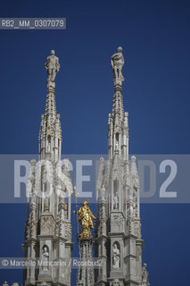 Spiers of Milan Cathedral and La Madonnina, a little statue of the Virgin Mary placed on the main spire (September 2008) / Guglie del Duomo di Milano e statua della Madonnina posta sulla guglia più alta (settembre 2008) - ©Marcello Mencarini/Rosebud2