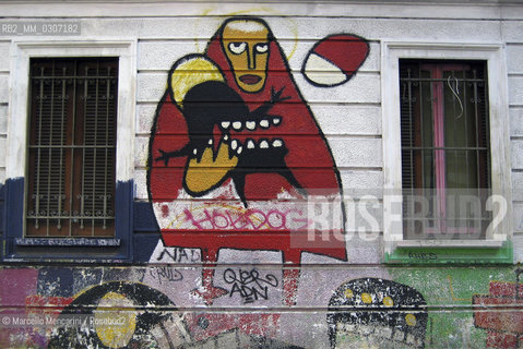 Milan, September 2008. Graffiti on the outer wall of the Community Center Pergola, on via Angelo della Pergola / Milano, settembre 20080. Graffiti sul muro esterno del Centro sociale Pergola in via Angelo della Pergola - ©Marcello Mencarini/Rosebud2