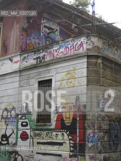 Milan, December 2008. Graffiti on the outer wall of the Community Center Pergola, on via Angelo della Pergola / Milano, dicembre 2008. Graffiti sul muro esterno del Centro sociale Pergola in via Angelo della Pergola - ©Marcello Mencarini/Rosebud2