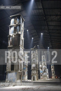 Milan, Hangar Bicocca, January 2006. The Seven Heavenly Palaces installation by Anselm Kiefer. It takes its name from the palaces described in an ancient Hebrew tract, the Sefer Hechalot or Book of Palaces, which describes the symbolic path of spiritual initiation of those who wish to enter into the presence of God. Each of the towers its own name: Falling Stars, Sternenlager, Die Sefiroth, Tzim-Tzum, Shevirat Ha-Kelim, Tiqqun, and The Seven Heavenly Palaces.  / Milano, Hangar Bicocca, gennaio 2006. I sette palazzi celesti, installazione di Anselm Kiefer. Lopera prende il nome dai palazzi descritti in un antico trattato ebraico, il Sefer Hechalot o Libro dei Palazzi, che descrive il percorso simbolico di iniziazione spirituale di coloro che vogliono giungere alla presenza di dio. Ogni torre ha un proprio nome: Falling Stars, Sternenlager, Die Sefiroth, Tzim-Tzum, Shevirat Ha-Kelim, Tiqqun, and The Seven Heavenly Palaces. - ©Marcello Mencarini/Rosebud2