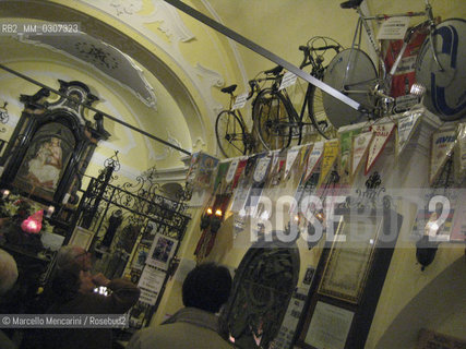 Ghisallo Pass near Bellagio (Como); 2008. Church of the Madonna del Ghisallo; the patron saint of cyclists, where are preserved jerseys and bikes of the main champions / Valico del Ghisallo vicino a Bellagio (Como); 2008. Chiesa della Madonna del Ghisallo; protettrice dei ciclisti; al cui interno sono conservate maglie e biciclette dei principali campioni - ©Marcello Mencarini/Rosebud2