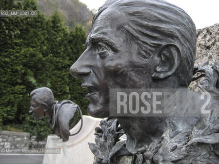 Ghisallo Pass near Bellagio (Como); 2008. Statues of Coppi and Bartali in the square of the Madonna del Ghisallo Church; the patron saint of cyclists, where are preserved jerseys and bikes of the main champions / Valico del Ghisallo vicino a Bellagio (Como); 2008. Statue di Coppi e Bartali nel piazzale della Chiesa della Madonna del Ghisallo; protettrice dei ciclisti; al cui interno sono conservate maglie e biciclette dei principali campioni - ©Marcello Mencarini/Rosebud2