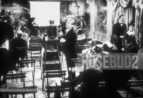 Historical reconstruction by Paul Paviot of the first public film screening on 28 December 1895 in the Salon Indien of the Scribe Hotel by the Lumière brothers / Ricostruzione storica di Paul Paviot della prima proiezione cinematografica dei fratelli Lumière nel Salon Indien dellHotel Scribe a Parigi il 28 dicembre 1985 - Reproduced by Marcello Mencarini
/Rosebud2