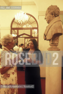 Pesaro, Rossini Opera Festival 1997. Audience in the foyer of the Rossini Theater / Pesaro, Rossini Opera Festival 1997. Pubblico nel foyer del Teatro Rossini - ©Marcello Mencarini/Rosebud2