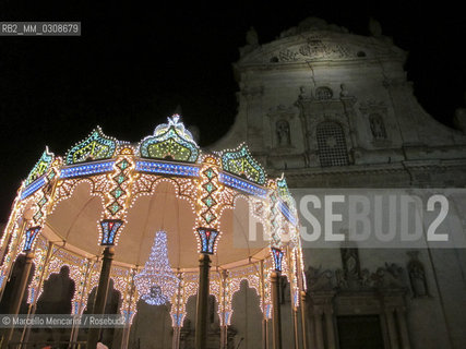 Galatina, Italy, Church of Saints Peter an Paul (Chiesa Madre dei Santi Pietro e Paolo) and stage to dance the Pizzica, a traditional dance born here to heal tarantolati, almost always women suffering from hysterical crisis regarded as a consequence of the bite of the tarantula spider / Galatina (Lecce), Chiesa Madre dei Santi Pietro e Paolo e palco per ballare la Pizzica, una danza tradizionale nata qui per curare i tarantolati, in genere donne colpite da crisi isteriche attribuite al morso della tarantola - ©Marcello Mencarini/Rosebud2
