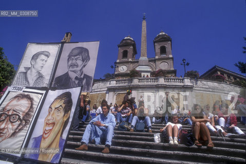 Rome, Trinità dei Monti and Spanish Steps. In the foreground,  the drawings of a caricaturist / Roma, Trinità dei Monti e scalinata di piazza di Spagna. In primo piano, i disegni di un caricaturista - ©Marcello Mencarini/Rosebud2