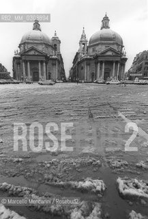 January 6, 1985. Snow in Rome: the twin churches of Santa Maria in Montesanto (left, built 1662-75) and Santa Maria dei Miracoli (right, built 1675-79) in Piazza del Popolo / 6 gennaio 1985. Neve a Roma: le chiese gemelle in Piazza del popolo. A sinistra la Basilica di Santa Maria in Montesanto e  a destra la Chiesa di Santa Maria dei Miracoli - ©Marcello Mencarini/Rosebud2