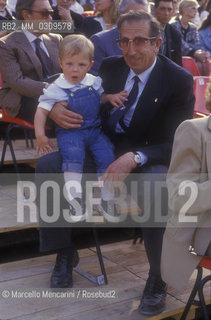 Rome, Piazza di SIena Horse Show, 1987. Former  Italian show jumping rider Raimondo DInzeo and his grandson / Roma, concorso ippico di Piazza di Siena, 1987. Lex cavaliere campione olimpico Raimondo DInzeo con suo nipote - ©Marcello Mencarini/Rosebud2