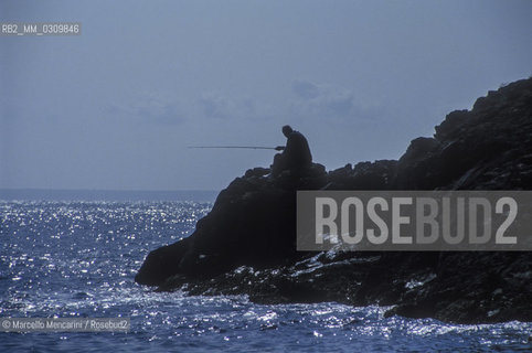 SARK ISLAND. Fisherman / ISOLA DI SARK. Pescatore - ©Marcello Mencarini/Rosebud2