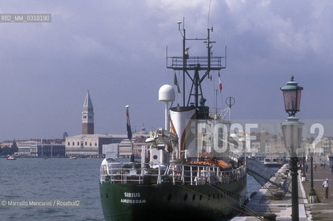 Venice, about 1990. A Greenpeace ship anchored in the St. Marks Basin / Venezia, 1990 circa. Nave di Greenpeace ancorata nel Bacino di san Marco - ©Marcello Mencarini/Rosebud2